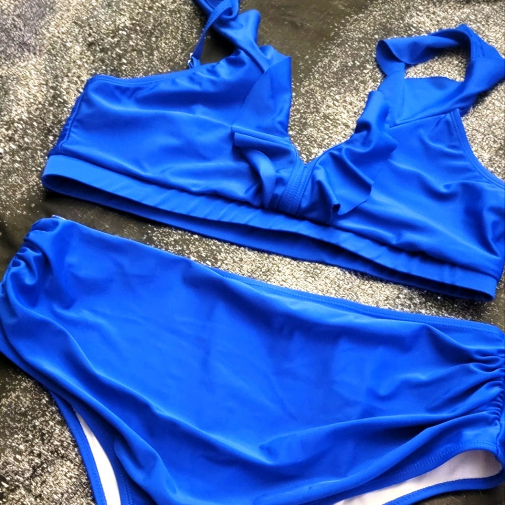 Blue swimsuit with roused high wasted bottoms